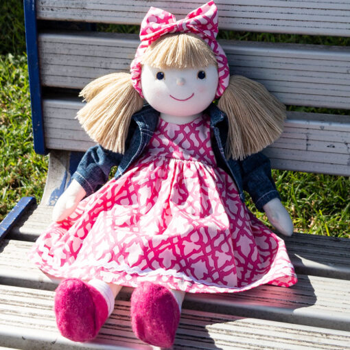 Handmade cloth doll seated